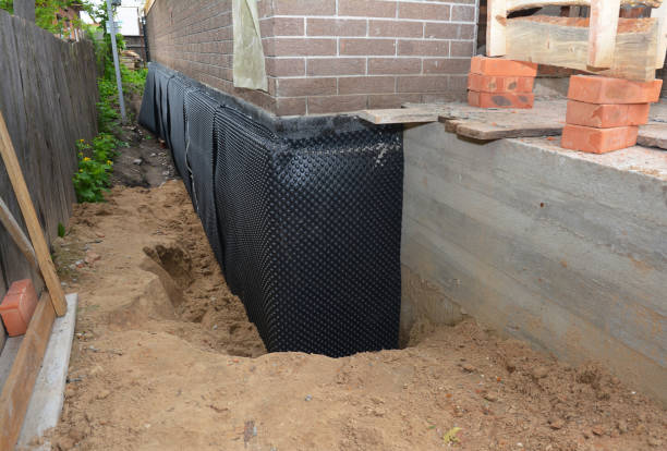 Happy homeowners after waterproofing job in Silverhill